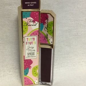 Too faced tuttifrutti lip glaze “who gives fig”new